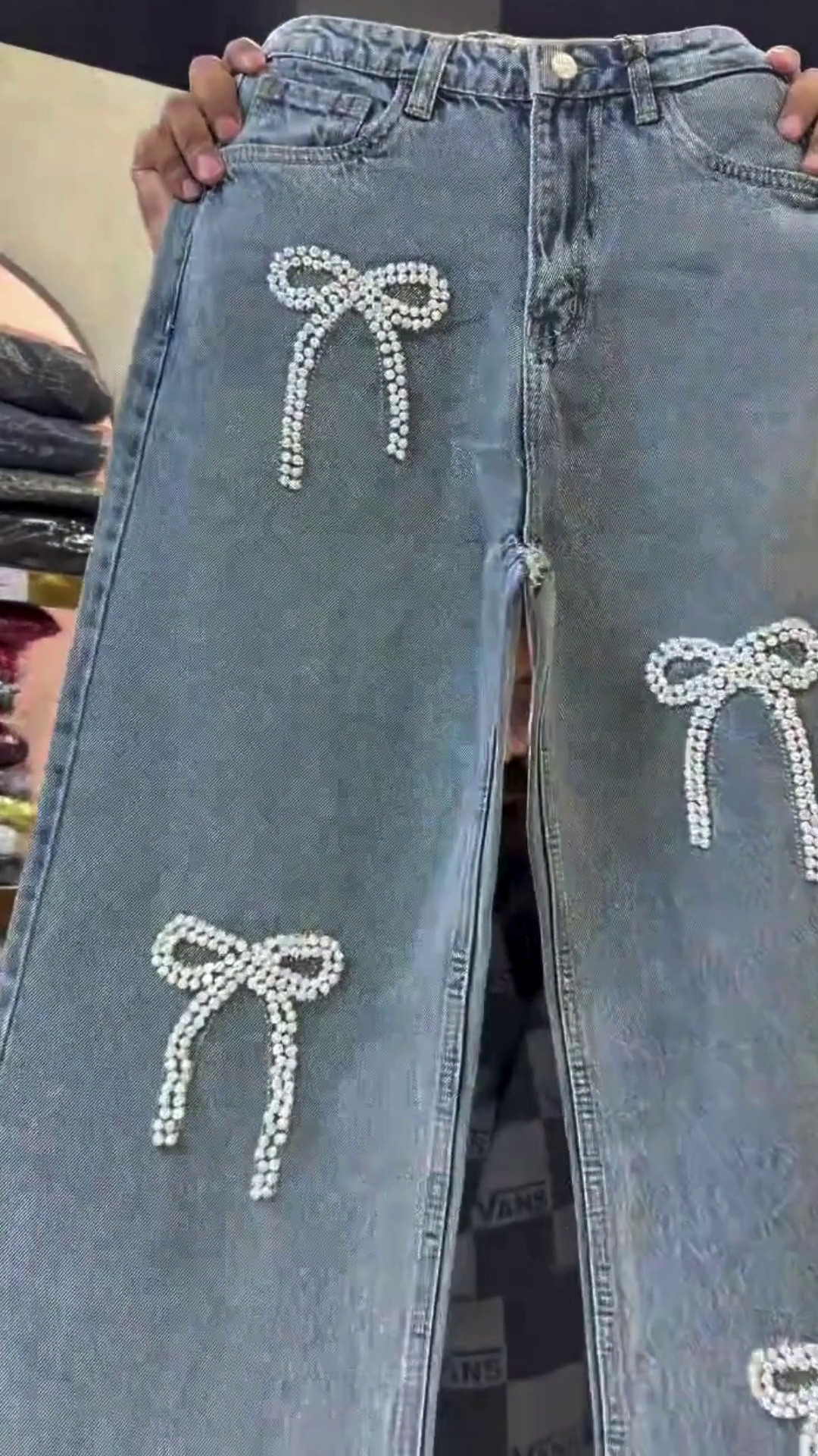 Light Blue High‑Rise Wide‑Leg Denim Jeans with All‑Over Pearl Bow Patch Detailing for Trendy Casual Wear” 👖