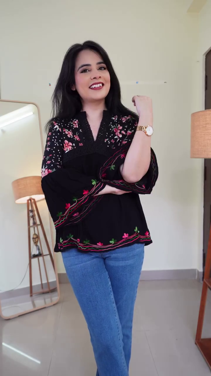 Black Floral Embroidered Peplum Top with Flared Sleeves & Contrast Red-Green Thread Detailing – Elegant Casual Statement Blouse