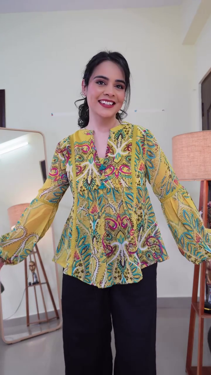 Black Floral Embroidered Peplum Top with Flared Sleeves & Contrast Red-Green Thread Detailing – Elegant Casual Statement Blouse