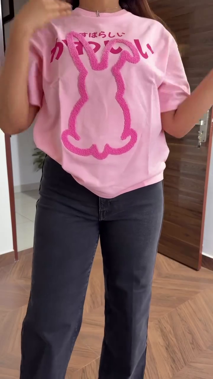 Bright Pink Shirt with White Sleeve Stripes, “S” Emblem, and Number Detailing Paired with Dark Wide-Leg Jeans and Maroon Shoes Casual Sporty Streetwear Look 🌸👕👖👟✨