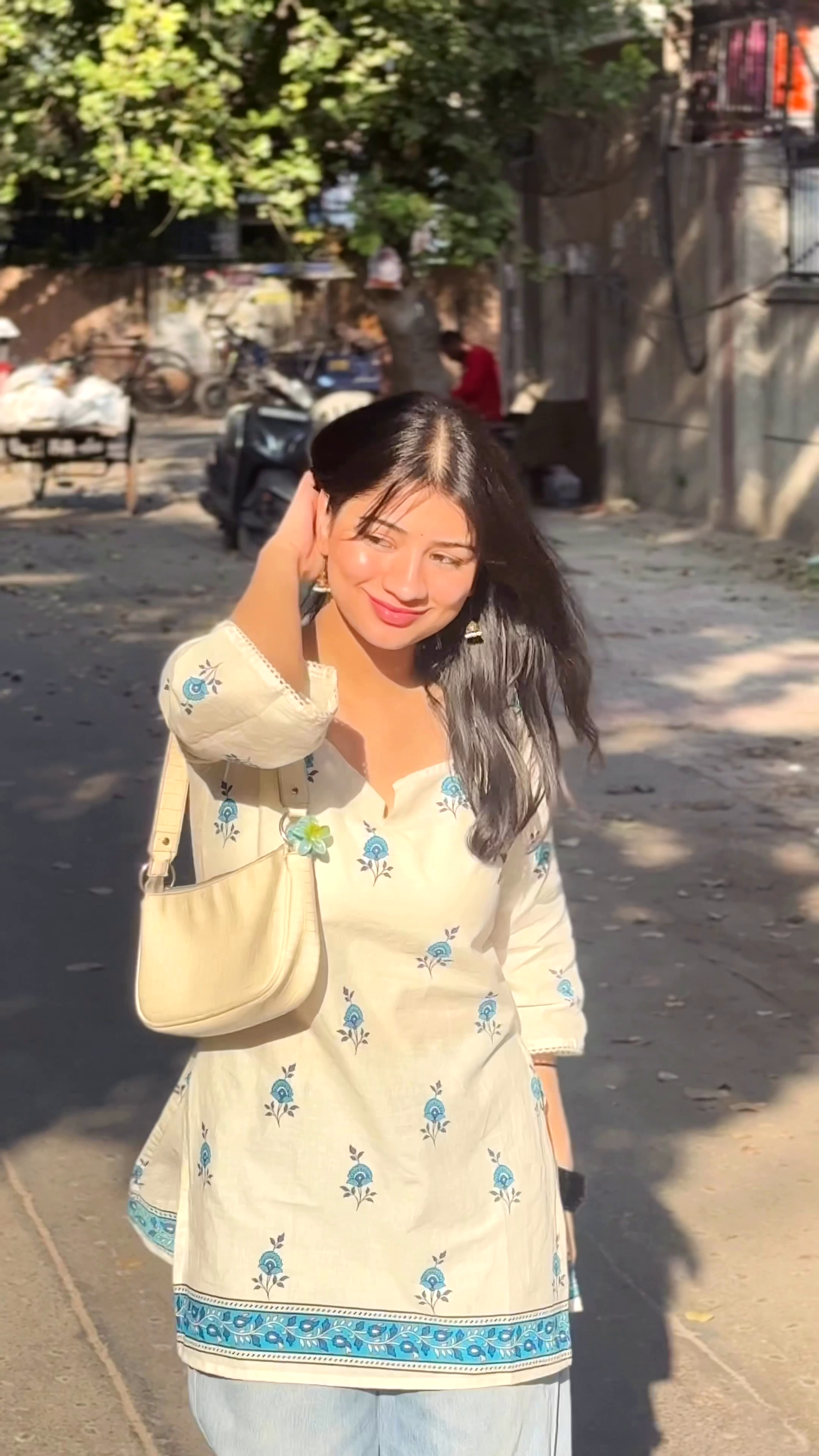 Cream Kurta with Blue Floral Embroidery and Patterned Border Paired with Light Blue Jeans Casual Outdoor Ensemble 🌼👗👖✨