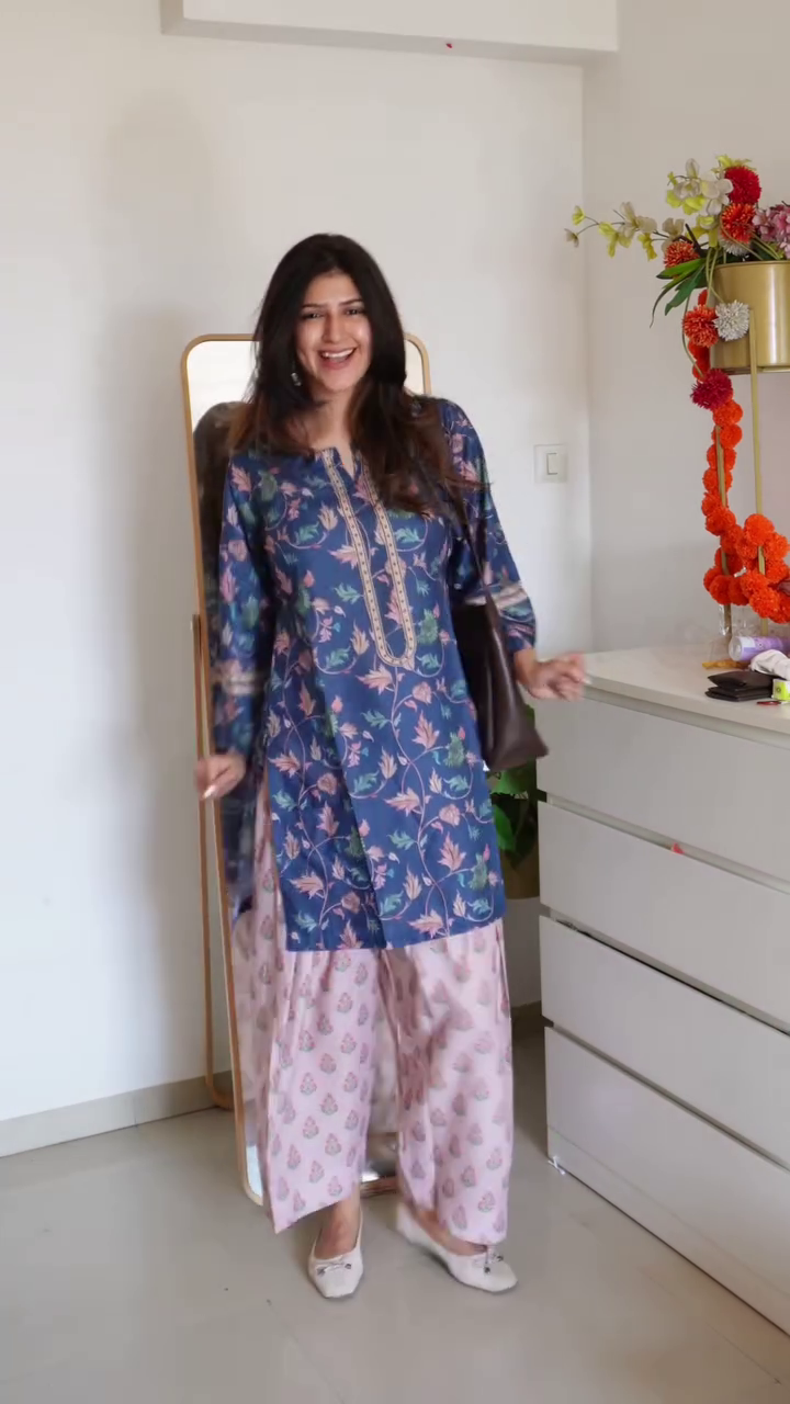 Bright Pink Dress with White Floral Patterns Paired with White Shoes and Brown Shoulder Bag Casual Vibrant Indoor Ensemble 🌸👗🤍👟👜✨